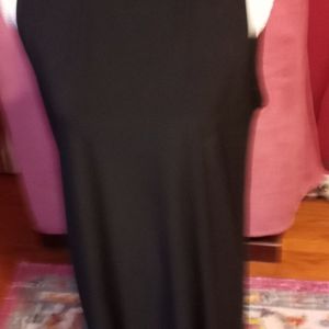 Tihain black dress with beading at neck.